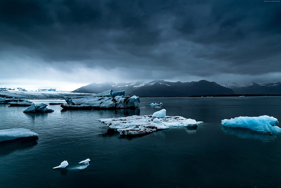 photography of ice rock on body of water HD wallpaper