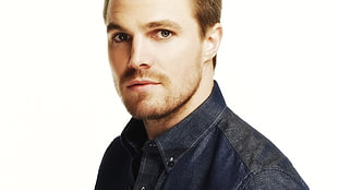 man in black button-up collared top