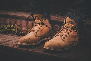 pair of brown lace-up boots HD wallpaper