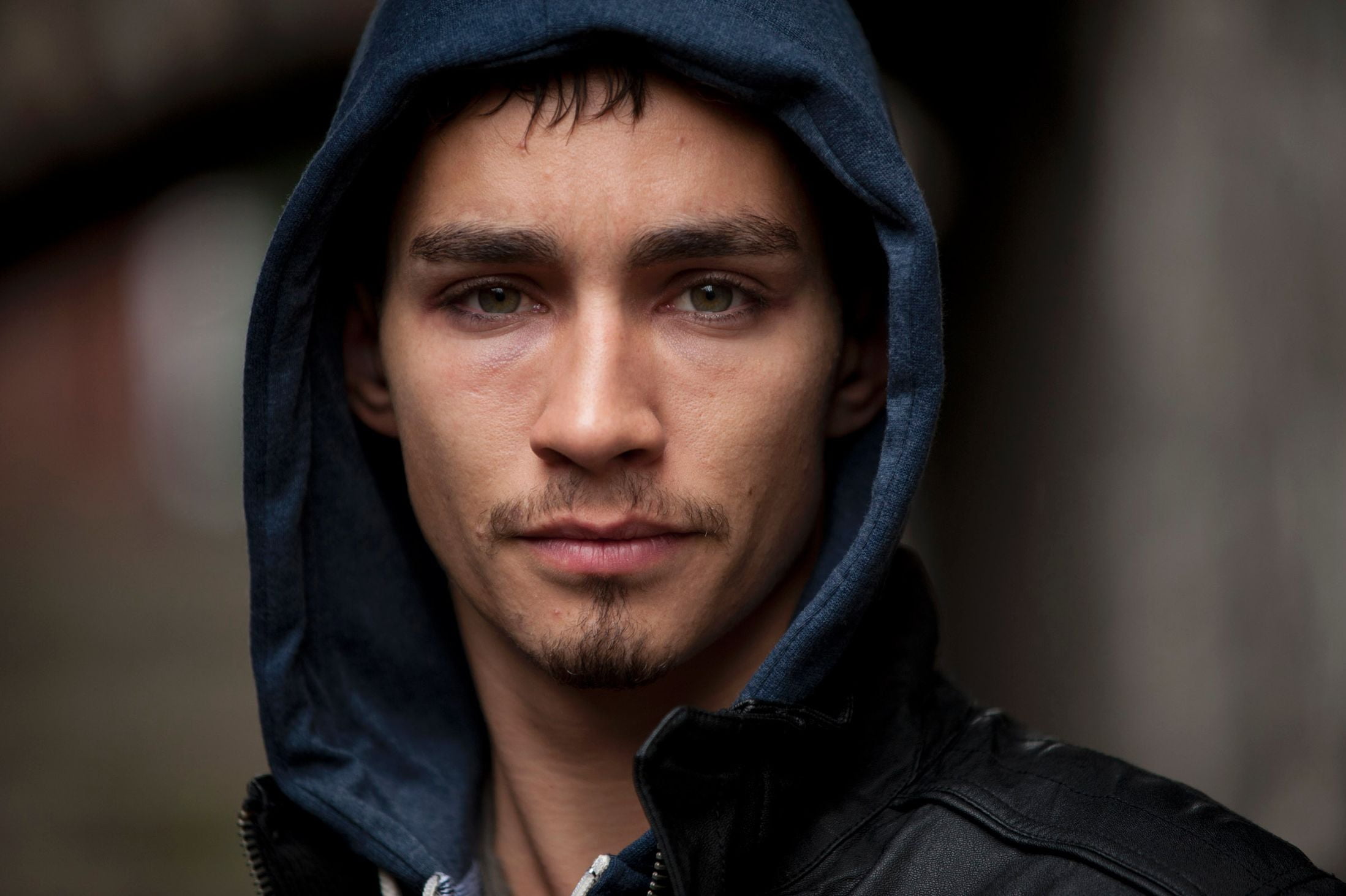 man wearing blue hoodie