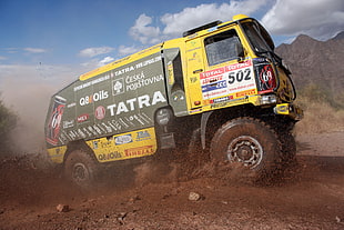 yellow and black haul truck, trucks, dirt, Dakar Rally HD wallpaper