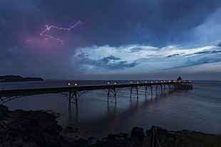 black bridge, lightning, storm, pier, sea HD wallpaper
