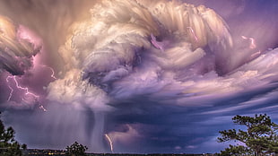 purple and white clouds painting