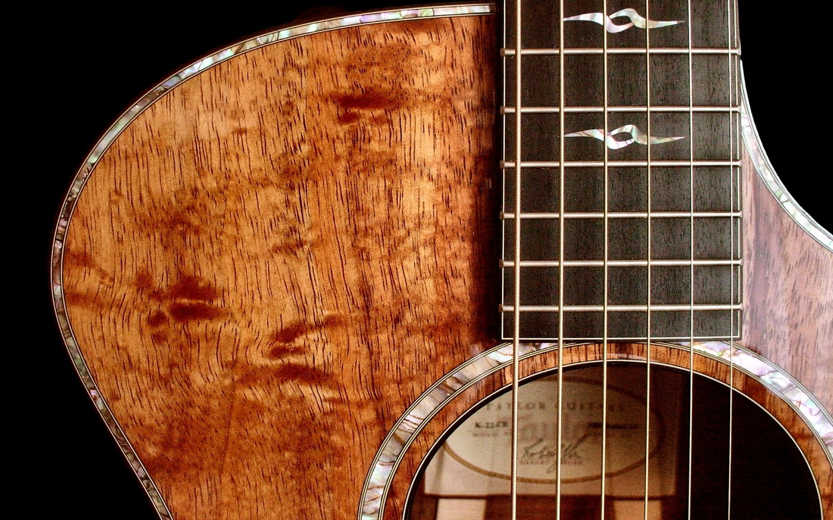 natural finish cutaway acoustic guitar