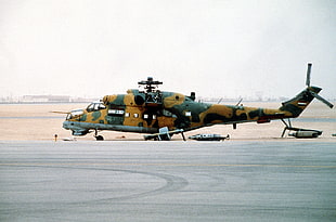 brown and gray helicopter, mi 24 hind, helicopters, military