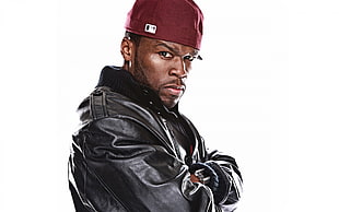 man wearing red cap and black leather jacket