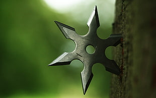 gray steel shuriken, shuriken, wood, depth of field, metal