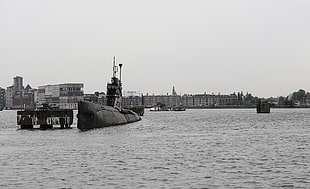 submarine on body of water grayscale photo
