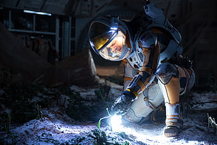 male wearing astronaut suit