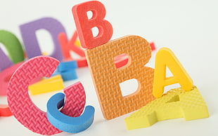 multicolored English Alphabet letters rubber mats