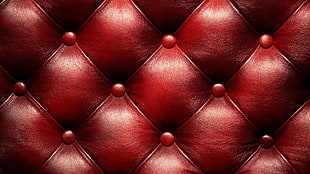 tufted red textile, leather
