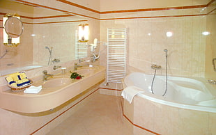 white ceramic bathtub with bathroom sink HD wallpaper