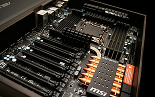 black MSI computer motherboard
