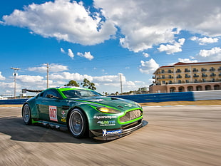 green coupe photo during daytime