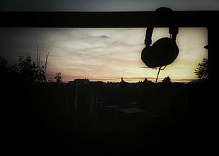 black headphones, sunset, nature