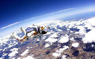 white astronaut suit, clouds, Red Bull, sky, horizon
