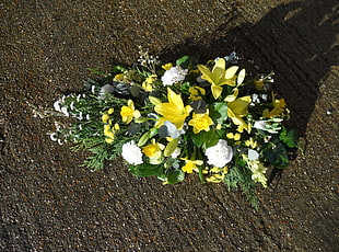 yellow Lilies and white Carnations cascade bouquet
