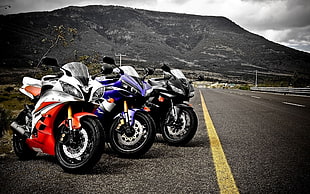 three assorted-color sports bikes, motorcycle, road