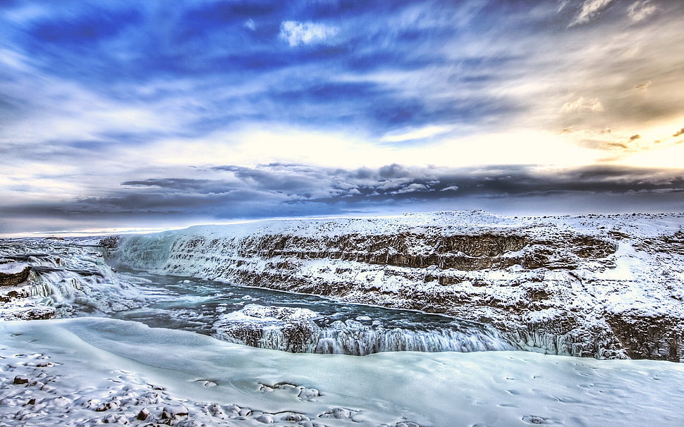 snow covered mountain under cloudy sky during daytime HD wallpaper