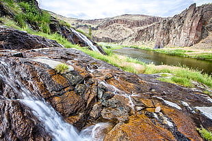time lapse photo of a river surrounded by mountain and grass during day time, owyhee, wild, oregon HD wallpaper