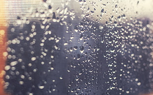 glass window with water droplets
