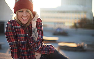 woman wearing red and white plaid dress shirt and red knit cap HD wallpaper