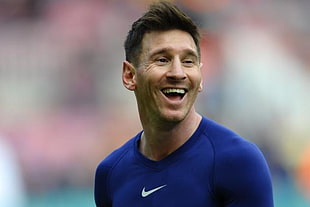 Lionel Messi wearing blue soccer jersey HD wallpaper