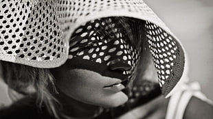 grayscale photography of woman in white mesh hood