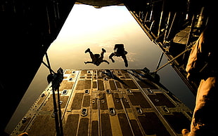 black and brown foosball table, aircraft, military, parachutes, jumping