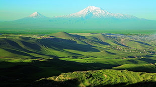 green plains across mountains HD wallpaper