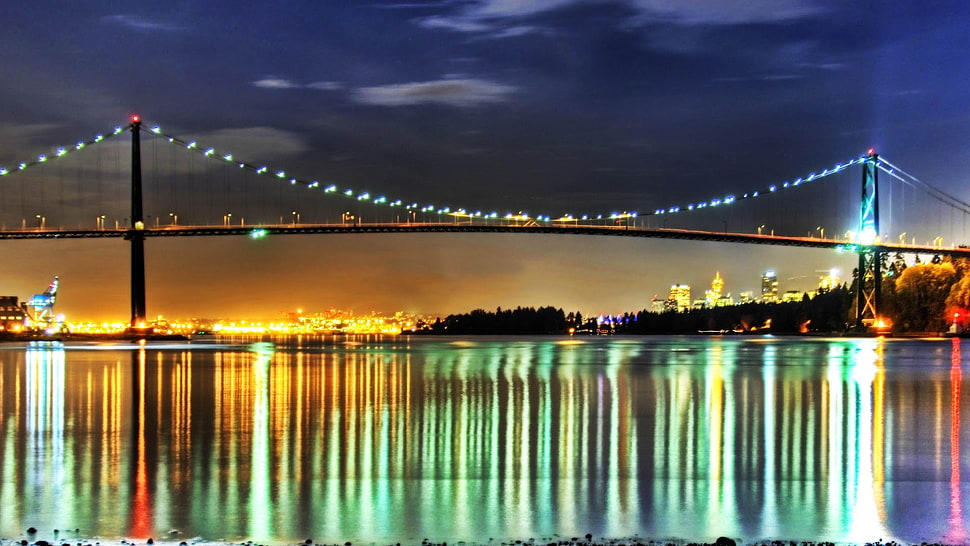 black suspension bridge with lights HD wallpaper