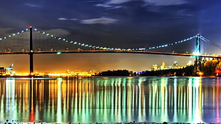 black suspension bridge with lights