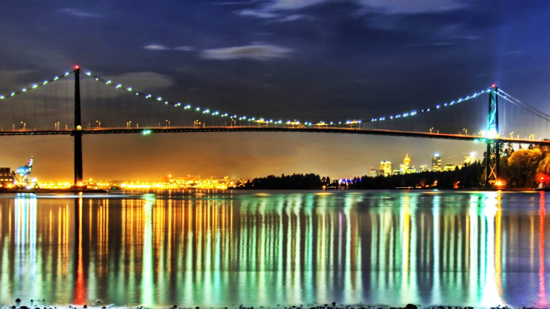 black suspension bridge with lights