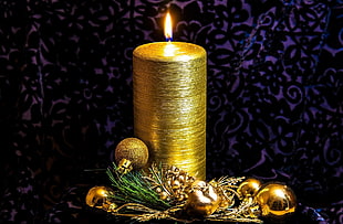 gold-colored pillar candle HD wallpaper