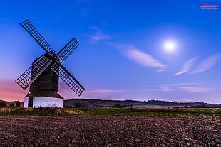 windmill with grass field during nighttime HD wallpaper