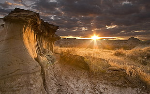 brown rock formation during sunset HD wallpaper
