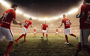 soccer players in red soccer jersey playing soccer on soccer field