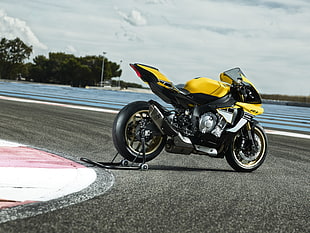 black and yellow sport motorcycle