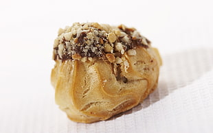 brown pastry on white textile