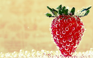 shallow focus photography of strawberry with water droplets
