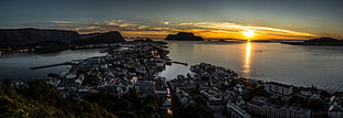 aerial photography of city surrounded by body of water during dusk, norway HD wallpaper