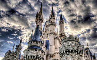 worm's eyeview photograph of white and blue concrete castle
