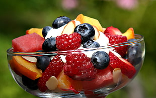 fruits salad on clear glass bowl
