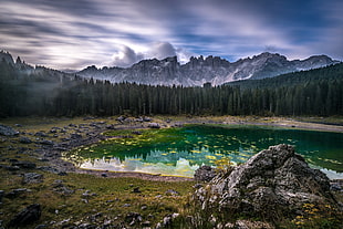 rock near pond, south tyrol, italy, rainbow lake HD wallpaper
