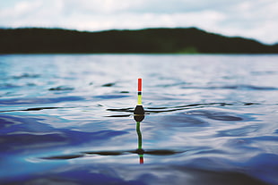 red, yellow, and black buoy HD wallpaper
