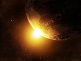 planet earth with reflecting light of sun digital wallpaper