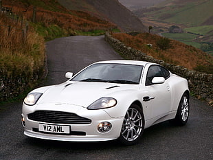 white Aston Martin coupe