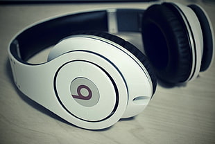white Beats by Dr. Dre headphones, plastic, headphones, technology, beats by dr.dre