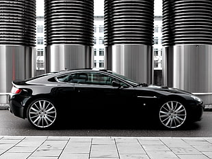 black coupe on concrete road at daytime