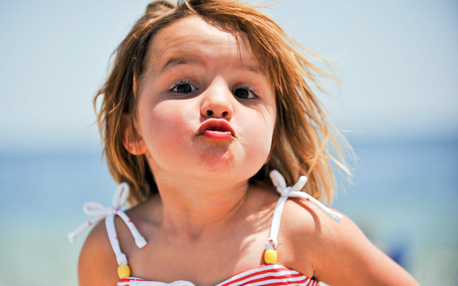 girl making duck face photo